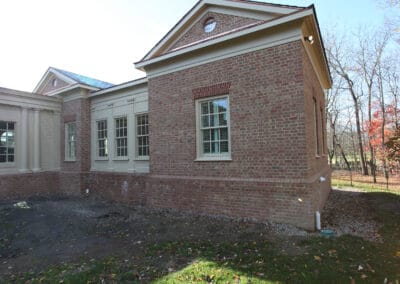 A custom built home featuring brick exterior.