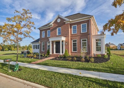 An exterior of a red brick home