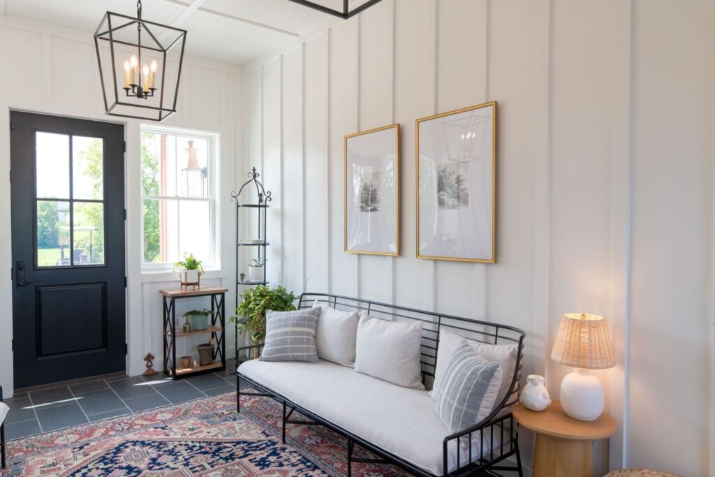 Contemporary foyer with white panelling.